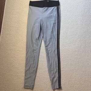Gray Athletic Leggings with Black Waistband and Side Metallic Stripe